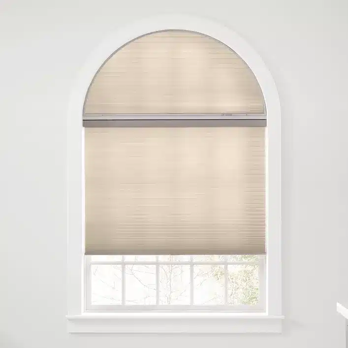 Perfect-arch honeycomb shade on a Great Falls specialty window